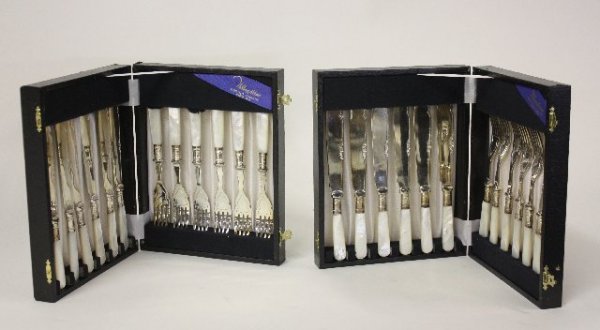 William Adams Sheffield fish set: With mother of pearl handles. 12 knives, 12 forks. From the Estate of Dr. Bernard Eisenstein.