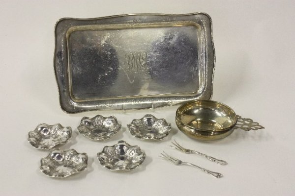 Group lot of assorted sterling silver: Includes: 5-3.25" Diam. ruffled sterling silver nut dishes (Approx. 3 oz.), 2 odd pickle forks (Approx. 2 oz.), 1 Gorham sterling silver porringer, 1- 8" x 13" Gorham sterling silver tray with design 