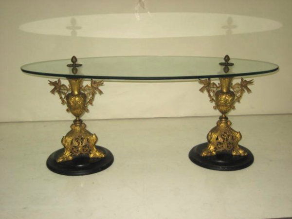 Bronze coffee table with glass oval top: Approx. 44" L x 22" W x 19" H