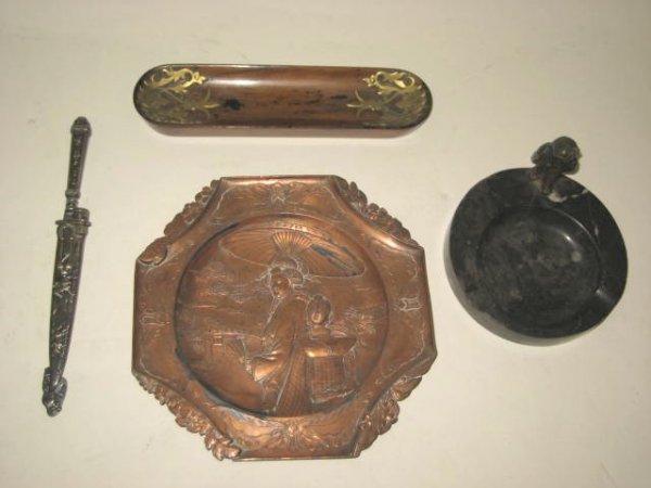 Group lot of assorted smalls: Includes: 1-7 1/8" Japanese raised image copper plate, 1-7.75" wood & brass pen holder, 1-letter opener with cowboy & bull decoration in original case & 1-art deco bronze owl & marble ashtray.