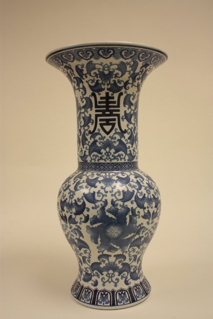 Chinese urn stamped Bombay: Blue & white. Made in China. Good condition. Approx. 23" H. From the estate of Charles Mogensen.