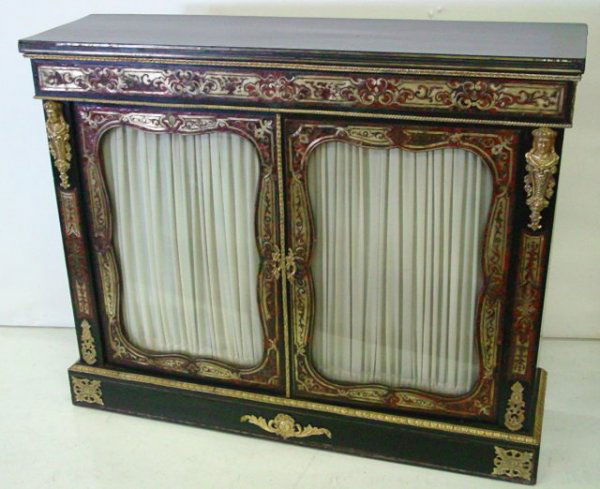 Antique ebonized boulle two door credenza: Bronze mounted. Approx. 39.75" H x 13.75" D x 49" W