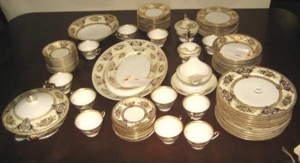 Set of handpainted Meito China dinnerware: Includes: 12 dinner plates, 23 soup bowls, 11 cups, 12 cake plates, 12 ice cream bowls, sugar & creamer, gravy boat, serving bowl, covered tureen, 10 luncheon plates, 2 oval trays. Some paint wear.