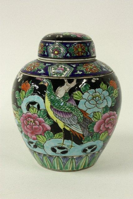 Oriental covered ginger jar: Peacocks & floral design on black background. Approx . 8" H
