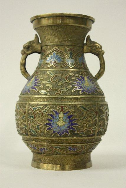 CHampleve two handled vaseW: With blue dragon. Approx. 12" H