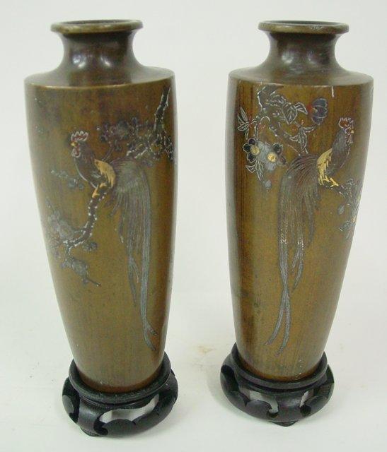 Pair bronze vases with etched birds One signed.: One signed. Approx. 6" H. From the estate of an anonymous Orientalia collector in Edison, New Jersey.