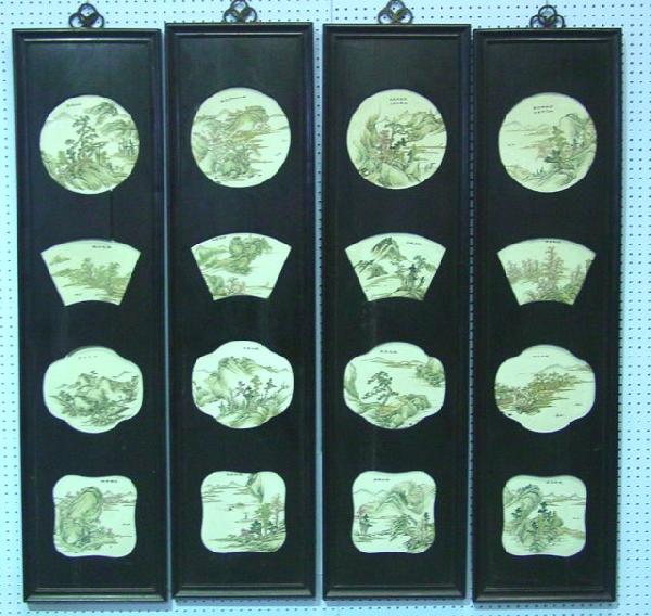 Set of 4 antique Chinese wall decorations: Each have four handpainted porcelain plaques artist signed depicting "Various Landscapes". Porcelain is perfect, minor cracks in wood. Total panel Approx. 61" H x 15.5" W