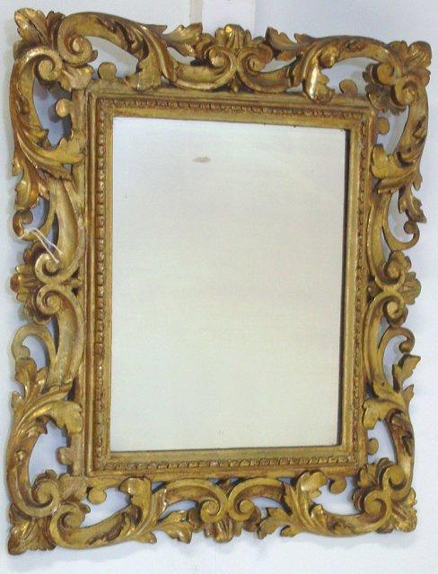 Italian giltwood hand carved mirror: Scroll design. Approx. 2' x 2.5'
