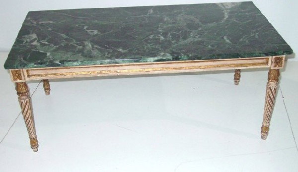 Pair Italian parcel gilt coffee tables: Approx. 40.5" x 21" x 15.5" H. From the Estate & Collection of Eric Schmidling.