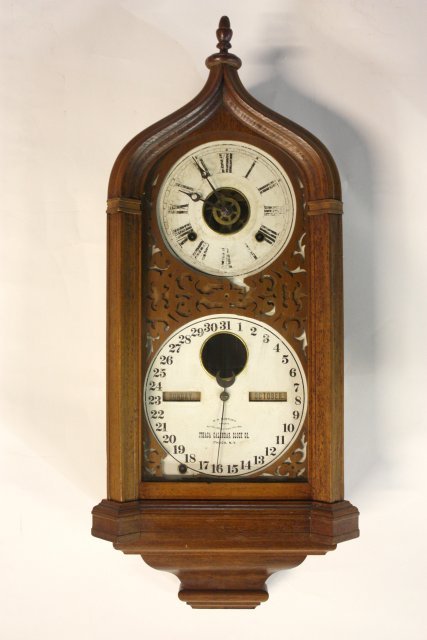 Victorian calendar clock by Ithaca Calendar Co.: Clock face worn. From the NYC estate of Milton & Dorothy Nowack.
