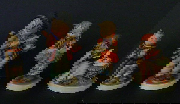 Group lot of 4 Hummels: 72FB "Little Fiddler", 81 2/0 stylized bee, 57/0 Full Bee, 76 2/0 stylized bee. Two have minor flakes on bottom.