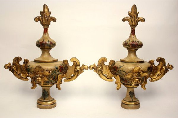 Pair Venetian style urn form wall ornaments: Painted on wood, decorated with floral sprays. Approx. 26" H. With appraisal by Gurr-Johns International. Appraised at $250