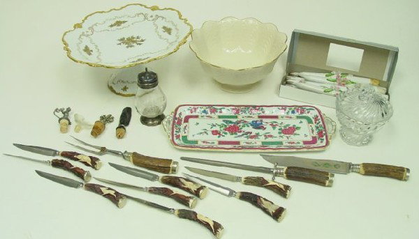Group lot assorted porcelain, glass & cutlery: Includes: cake stand, tray, porcelain decorative candles, Baccarat covered jar, grated cheese, figural bottle stoppers, horn handled cutlery set (8 knives & carving set with sharpener)