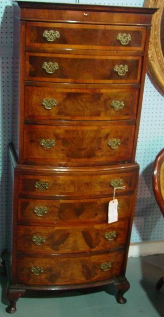 English crotch mahogany highboy: Custom made. 2 pc. With 8 banded drawers, carved drawers. Legs replaced. Approx. 65" H x 26" W x 14.5" D