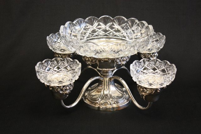 Sheffield English plated silver epergne ca. 1860's: With crystal inserts. Sold at Spencer, Orgell Silversmiths, Beverly Hills, CA. Approx. 8.5" H x 18.5" D.