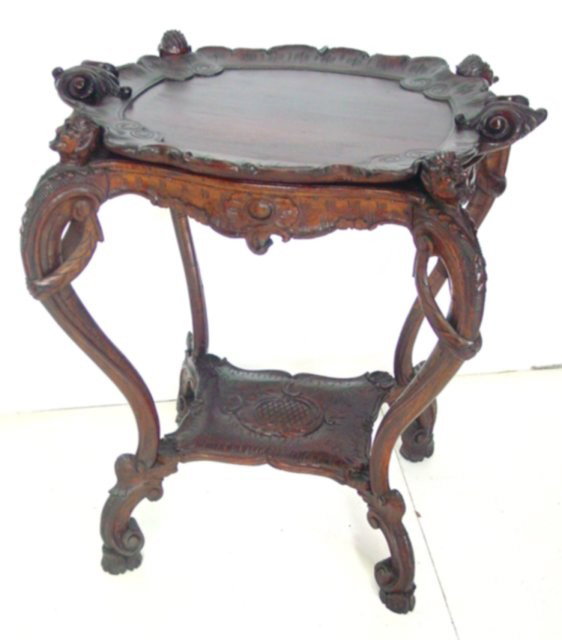 19th c. Italian carved walnut tray top table: With "Satyr" carved heads in corners. Crack in wood top. Approx. 26" W x18" x 29.5" H From a New York City Park Ave. Estate.
