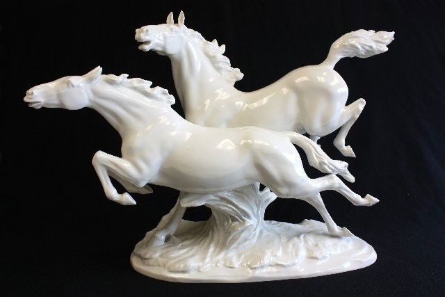 Hutchenreuther porcelain grouping: "Two Galloping Horses". Paper label Germany. Approx. 16.5" H x 22" W