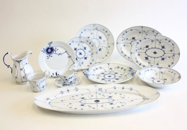 Royal Copenhagen dinnerware: "Blue Fluted Full Lace" pattern. Includes: 12 soup, 12 dinner plates, 4 coffee mugs, 8 small cups, 8 saucers, 6 luncheon plates, pitcher, 4 serving pieces (inlcuding fish platter) & 6 luncheon plates 