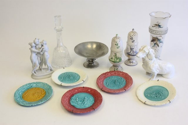 Group lot of assorted smalls: Includes: French sugar shakers, Nyphenberg porcelain dog, Parian grouping, glass vase, crystal decanter, 5 Majolica plates, Deco Denmark compote. 12 pcs. Contents of a Park Ave. estate.