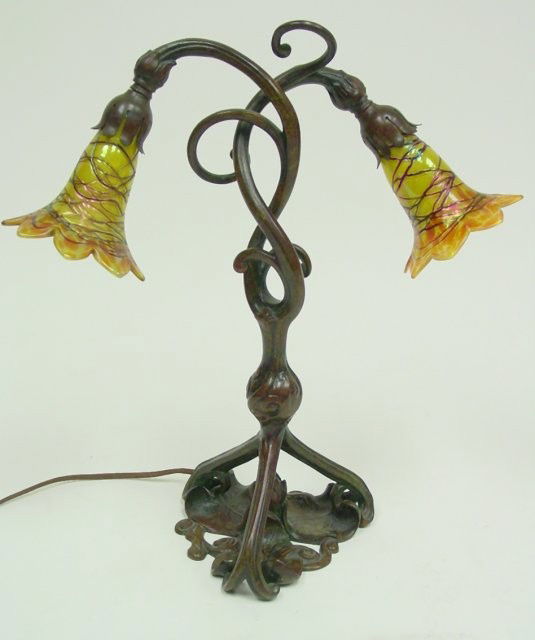 19th c. Austrian Art Nouveau bronze lily lamp: Either Loetz or Pallme-Koneig shades with iridescent papillon design. Porcelain sockets, no flaws, excellent condition. Approx. 16" h, 12" w.