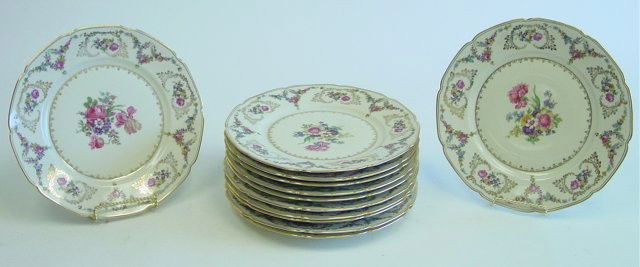 Set 12 Baronet Czechoslovakian service plates: "Caprice", depicting flowers. Approx. 10.75" Diam. Contents of the Brooklyn Heights Montague Terrace estate of J. Victor Herd & his wife Pauline Hoffman Herd