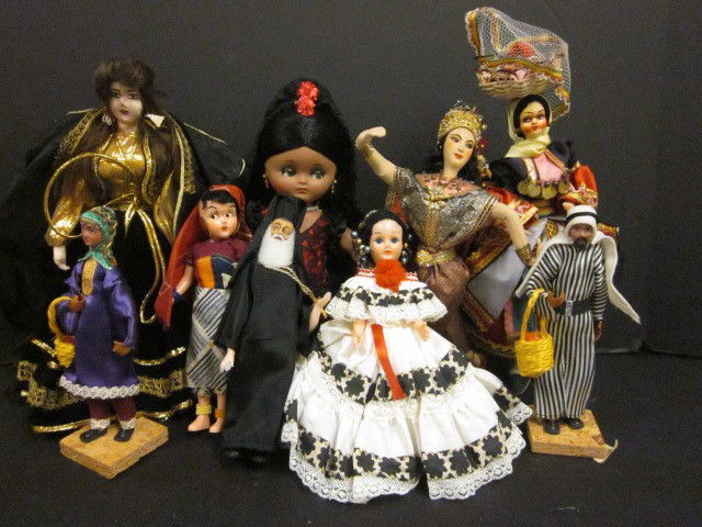 Group lot of dolls & accessories: Middle Eastern dancer, Priest, Israeli, Man & Woman, Spanish senorita, Greek woman, Palestinian woman, & tree topper. Contents of the Brooklyn Heights Montague Terrace estate of J. Victor Herd & his w