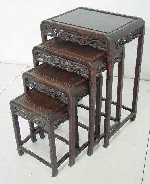 Early 20th c. Chinese carved nest of tables: Four tables in nest. Approx. 28" H x 14" x 18". Contents of the Brooklyn Heights Montague Terrace estate of J. Victor Herd & his wife Pauline Hoffman Herd