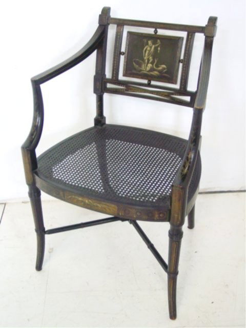 Adam's style paint decorated arm chair: ca. 1900-20's. WIth stretcher base, cane seat, back depicts painting of "Poseidon Riding Serpent". Approx. 34" H (back) x 21.5" (arm to arm)