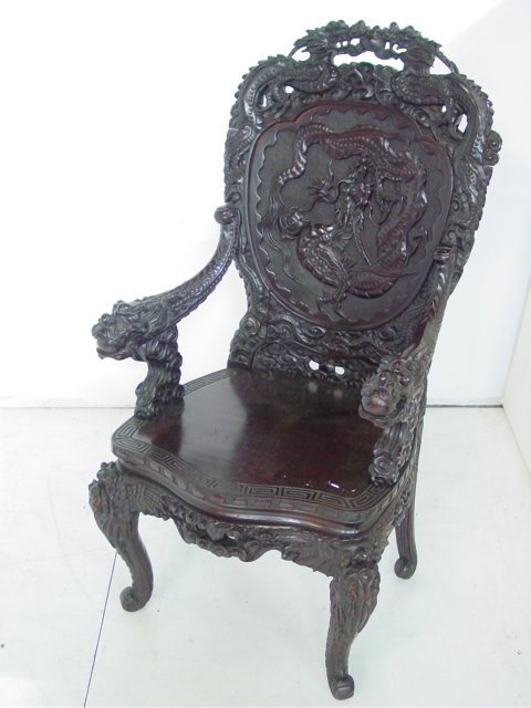 19th c. heavily carved Japanese throne chair: With dragons carved on arms & top. Approx. 50" H x 26" W (arm to arm).