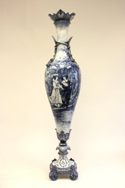 Royal Bonn scenic vase depicting "Lovers in Park": Blue & white. Small repair on top. Approx. 50" H