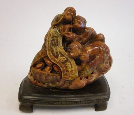 19th c. soapstone carving on wood base: "Three Evil Spirits". Base is cracked. Carving Approx. 8" W x 6.5" H x 5" D