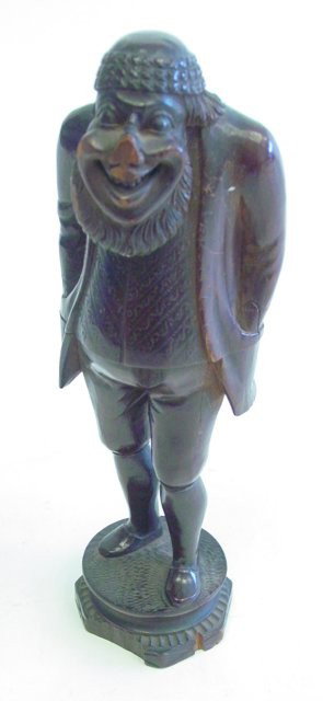 Continental boxwood figural nutcracker: Early 19th c. Approx. 7.75" H. From the estate of Carl Freed of K. Gluck Selig Antiques, mid-town Manhattan dealer.
