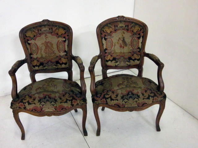 Pair French carved walnut needlepoint fautieuls: From the estate of Carl Freed of K. Gluck Selig Antiques, mid-town Manhattan dealer.