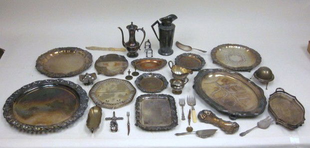 Lot of assorted silver plate items: Includes: trays, teapot, pitcher, trivets & others.