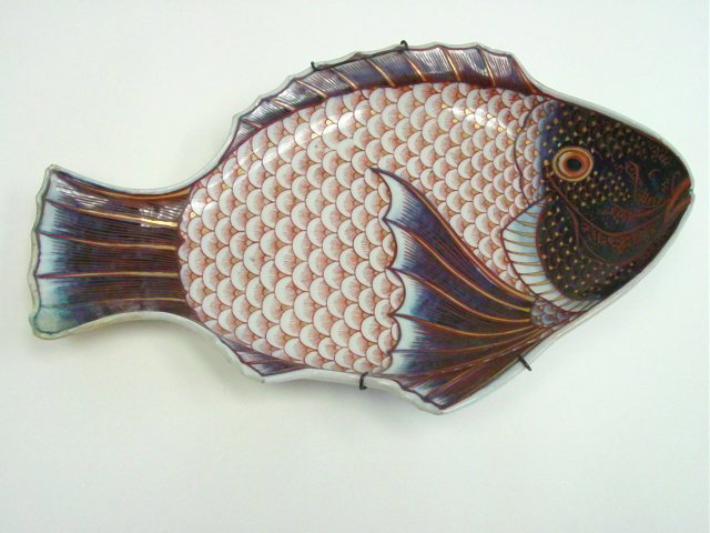 Antique Imari fish plate: Signed on back, old repair to tail. Approx. 13 "W x 8 1/2" H.