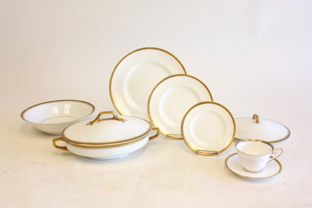 Royal Worcester service for 12 dinnerware set: Partial set. White with gold trim.