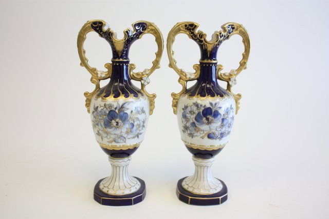 Pair of Royal Dux floral decorated vases: Cobalt & gilt. Approx. 11 1/4" H x 5" W.