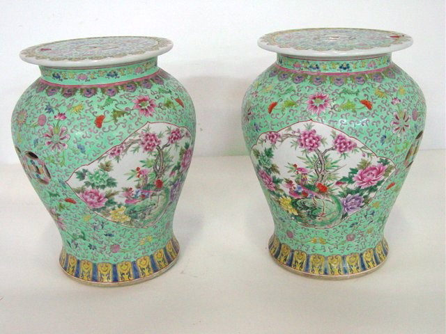 Pair of finely decorated garden stools: Multi-colored floral & bird design on turquoise ground. Excellent condition. Approx. 18" H. From a personal collection of Montclair collector.