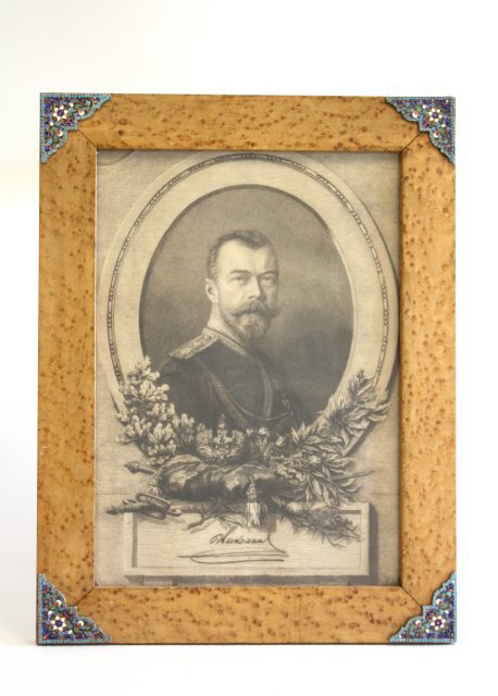 Birch wood frame A. Karelian: WIth etching "Nikolas II", silver enamel corners, crack in glass. Approx. 14" x 9.5". Please read our terms of sale.