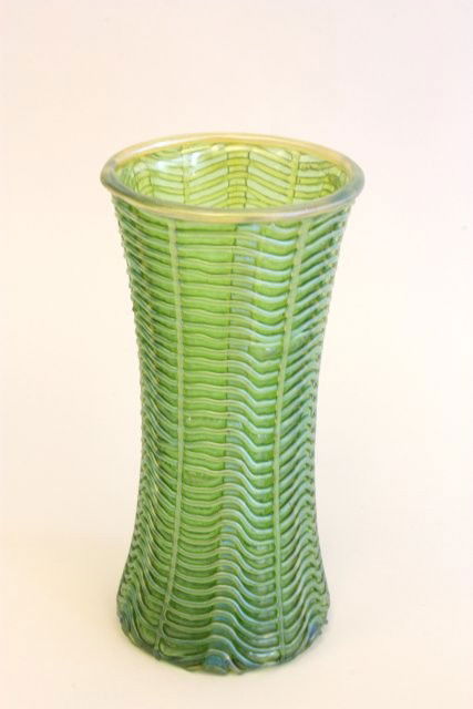 Loetz green cylindrical vase: Approx. 8" H. Please read our terms of sale.