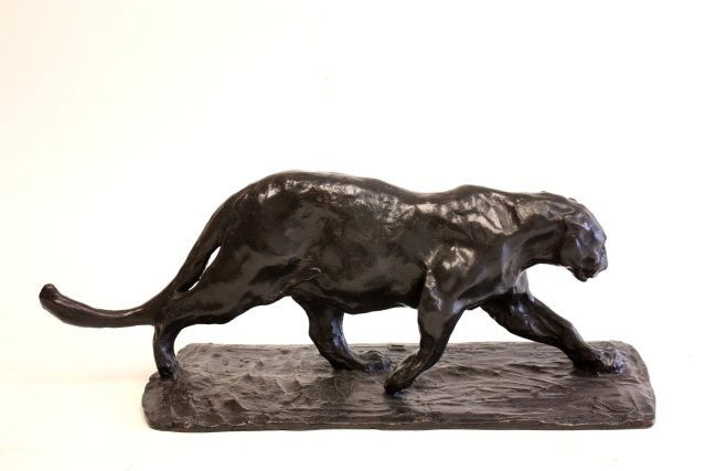 Bronze "Cougar" sculpture: After the sculptor Rembrandt Bugatti, with sculptor signature, approx. 24" across x 9" H x 9" D. Please read our terms of sale.