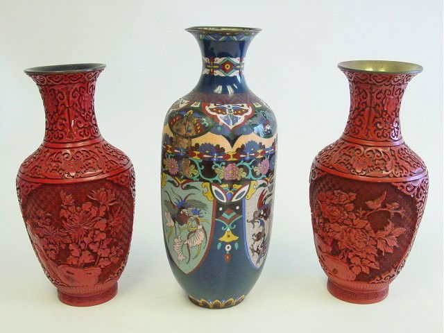 2 red lacquered vases & champleve vase: Lacquered vases approx. 12.75" each. Champleve vase approx. 14.5" H, as is. Please read our terms of sale.