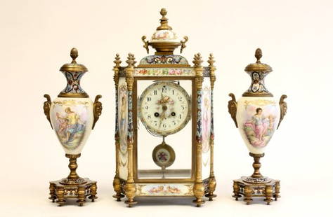 19th c. French porcelain & enameled clock set: Three pieces. Plaque stamped Limoges on clock. Urns approx. 15" H. Clock approx. 18.5" H. Please read our terms of sale.
