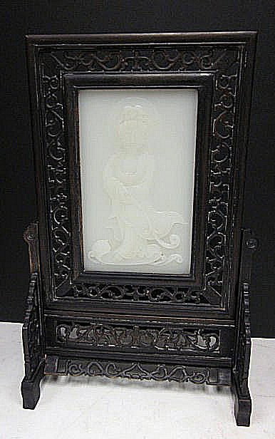 Chinese white jade & teakwood table screen: Of "Guan Yin". Approx. 17" H x 10" W. Please read our terms of sale.
