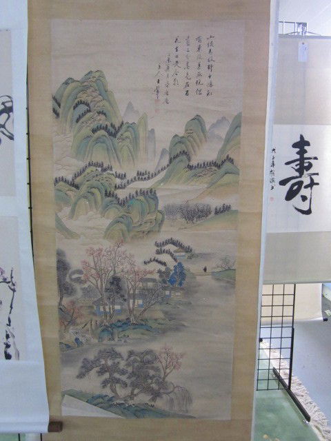 Chinese hand painted scroll signed Wang Hui: "Village by Mountains". Approx. 49.5" x 22.5". Please read our terms of sale.