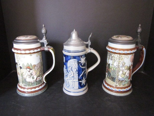 3 steins: Including: 2- Mettlach steins #2901 and #2902, both etched. 1- stein marked Germany. From a 60 year collection of a Chester, New Jersey gentleman. Please read our terms of sale.