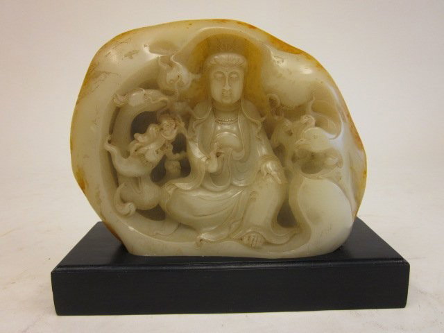 Carved soapstone sculpture of "Seated Budddha": On wood base. Approx. 8.5" x 6.5" H. Please read our terms of sale.