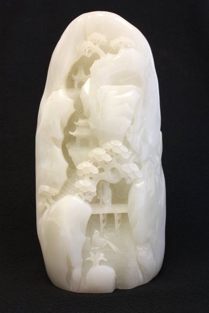20th c. white jade "He Tian Jade" carved scene: "Pon Trees with Home & People". Weighs approx. 5.6 lbs. Please read our terms of sale.