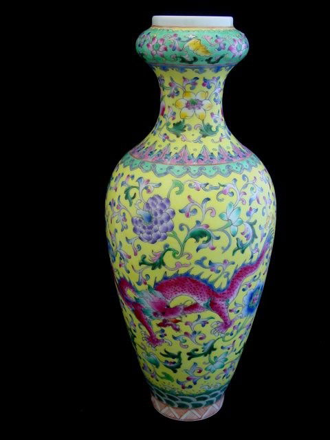 Enameled porcelain vase with yellow background: Depicting "Red Dragon & Blue Dragon" en verso, Qinglong mark. Approx. 16.25" H. From a 40 year collection. Please read our terms of sale.
