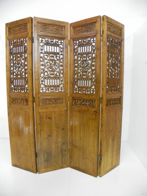 Four panel intricately carved screne: Huanghuali wood, Qing Dynasty - Xuanlong period. Appraised by Jane Werner-Aye. Approx. 89" x 19.5". From a 40 year collection. Please read our terms of sale.